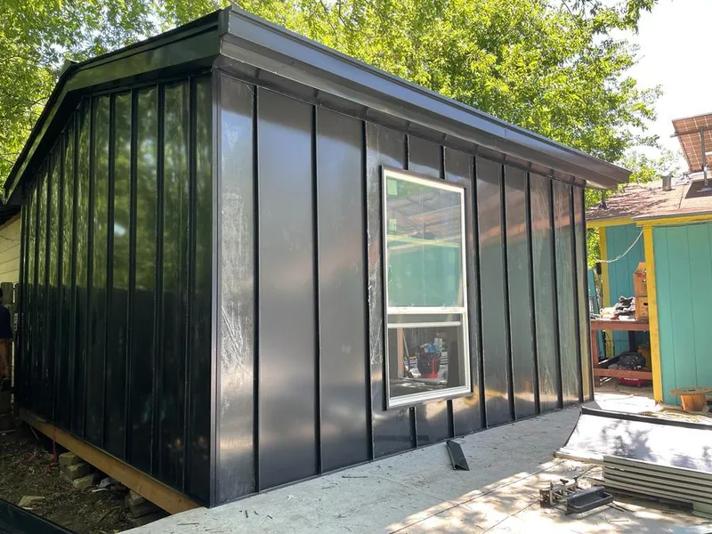 Black standing seam metal wall panels for Roof Inspection in International Falls