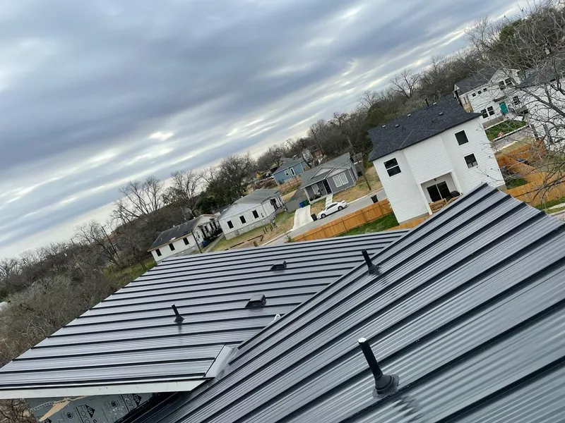Standing seam metal roof panels with vents for Skylight Repair in International Falls